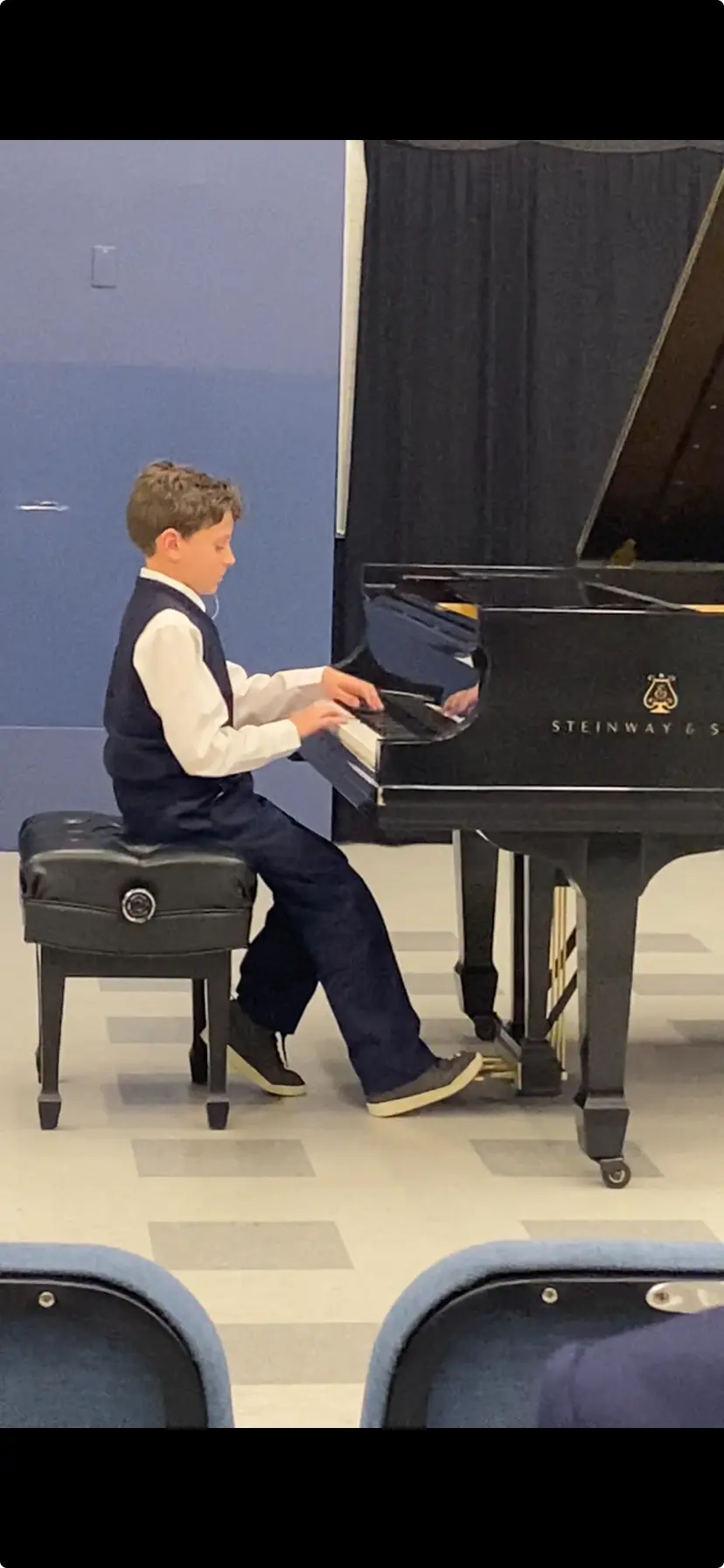 Student playing the piano